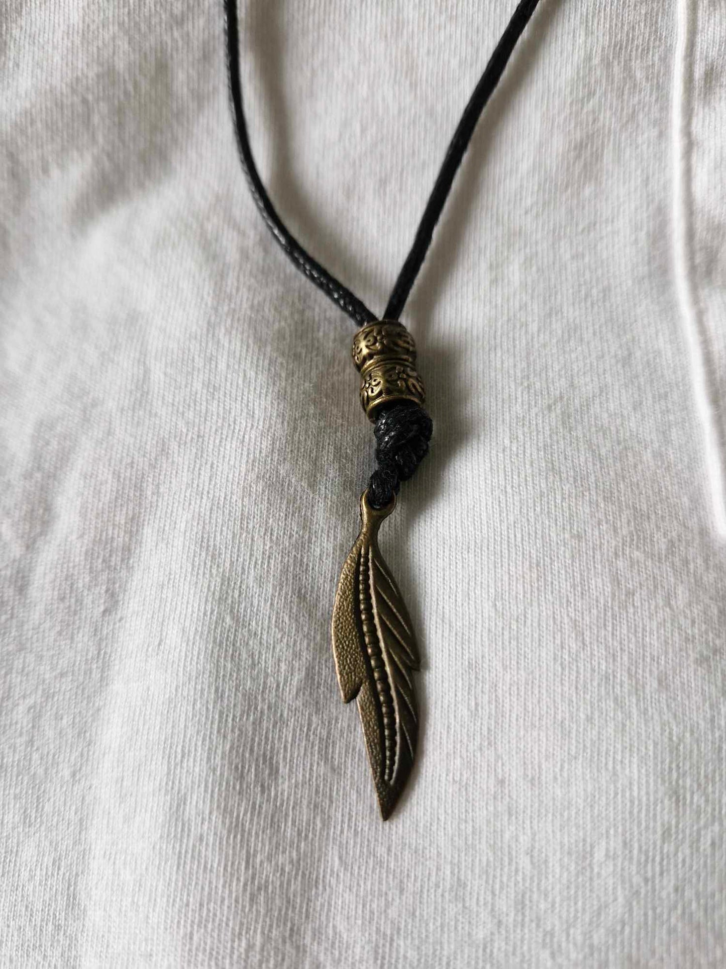 Men's angel feather pendant with adjustable cord