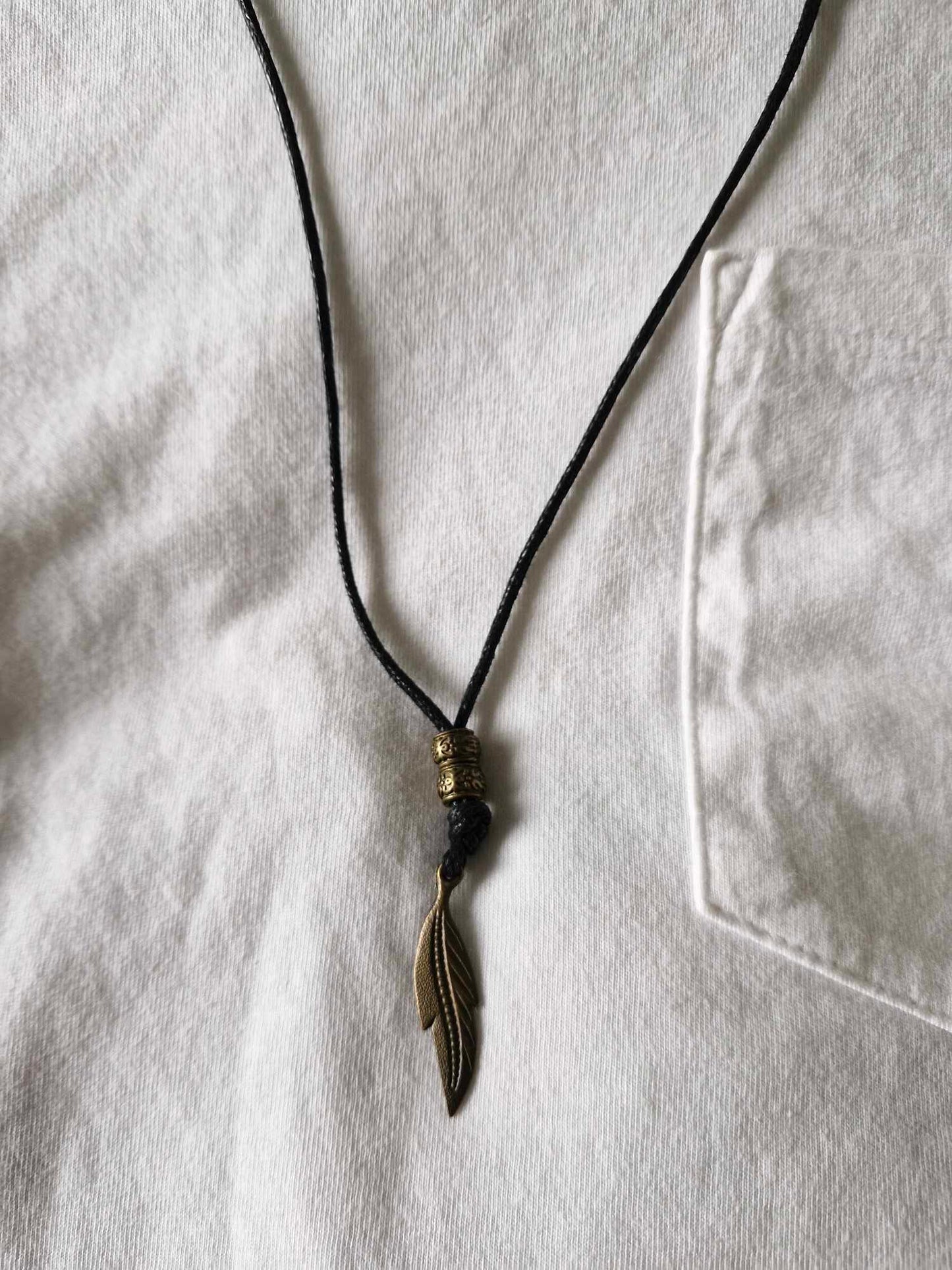 Men's angel feather pendant with adjustable cord