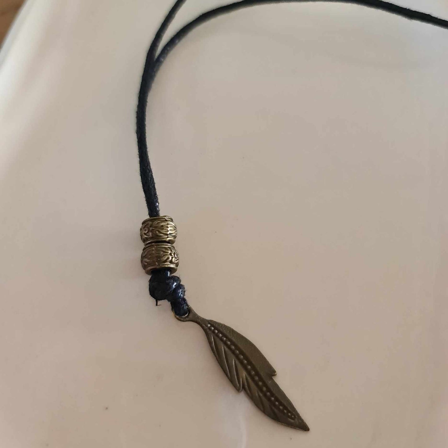 Men's angel feather pendant with adjustable cord